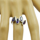Naomi abstract purple gemstone ring with four marquise-cut stones set in silver band
